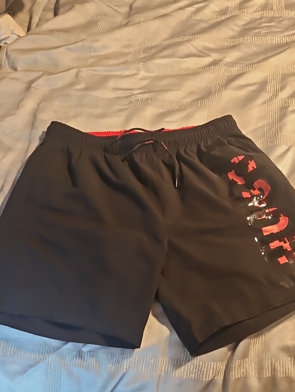 HUGO Black Athletic Shorts with Red Logo Accent